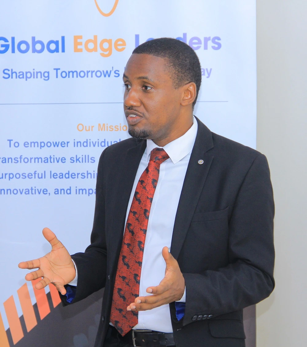 Daudi Mugabi working with clients
